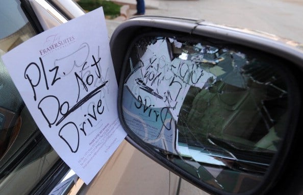 car mirror with note a note on a broken car mirror