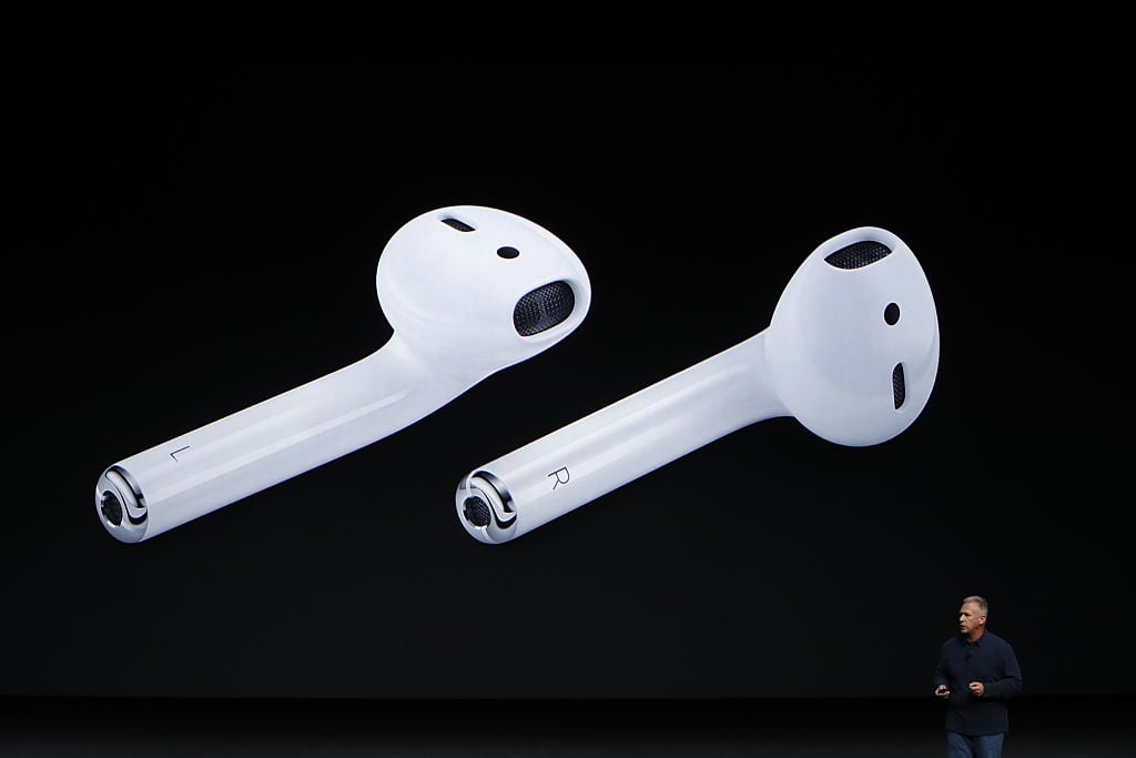 Apple Senior Vice President of Worldwide Marketing Phil Schiller announces AirPods during a launch event