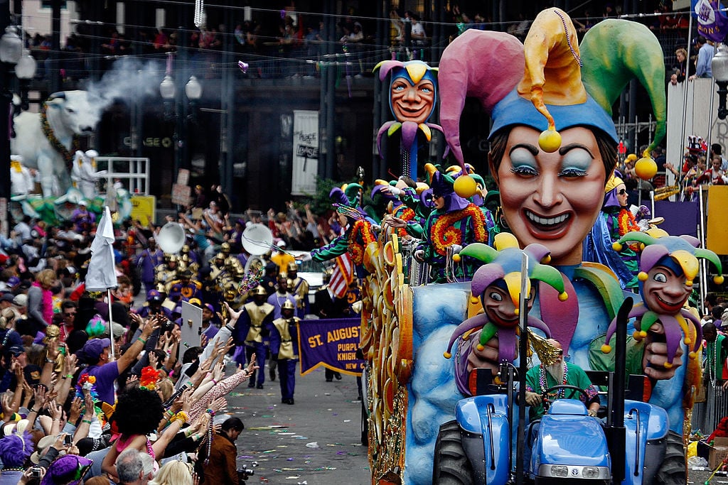 Floats in the Rex parade roll along St. Charles avenue on Mardi Gras in New Orleans, Louisiana.