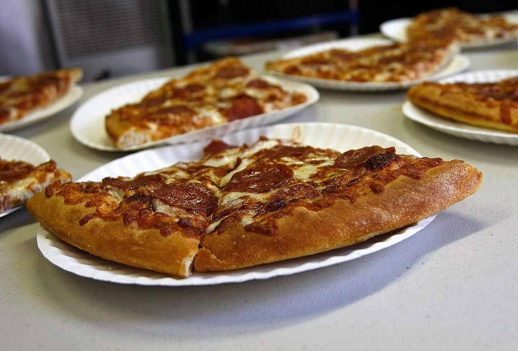 slices of pizza on plates