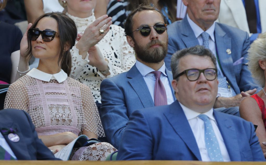 Pippa Middleton (L), and James Middleton (C) at The All England Lawn Tennis Club in Wimbledon, southwest London, on July 5, 2017 on the third day of the 2017 Wimbledon Championships. Pippa Middleton (L), and James Middleton (C) watch the play on Centre Court at The All England Lawn Tennis Club in Wimbledon, southwest London, on July 5, 2017 on the third day of the 2017 Wimbledon Championships.