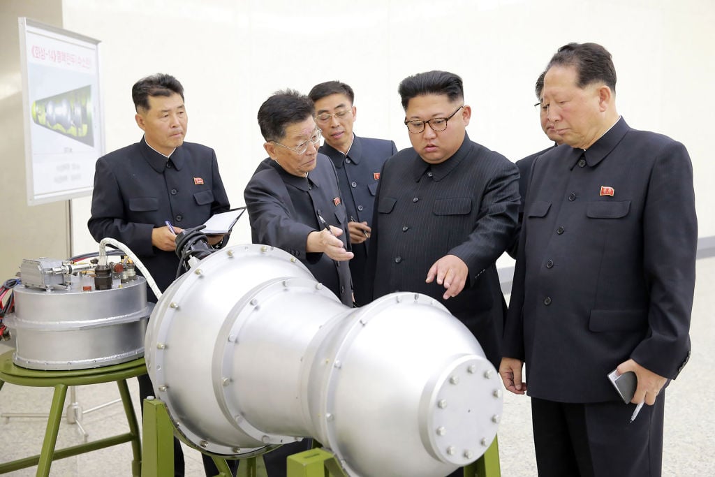 Kim Jong-un inspects a weapon