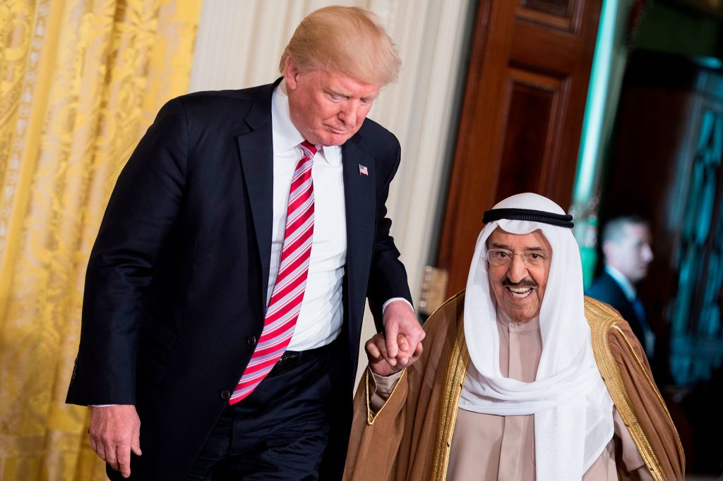 US President Donald Trump (L) and Kuwait's Emir Sheikh Sabah al-Ahmad Al-Sabah