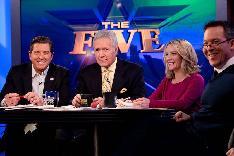 TV personality Alex Trebek (3rd R) and hosts of 'The Five' (L-R) Eric Bolling, Dana Perino and Greg Gutfeld attend FOX News' 'The Five' at FOX Studios on February 26, 2014 in New York City. | Noam Galai/Getty Images