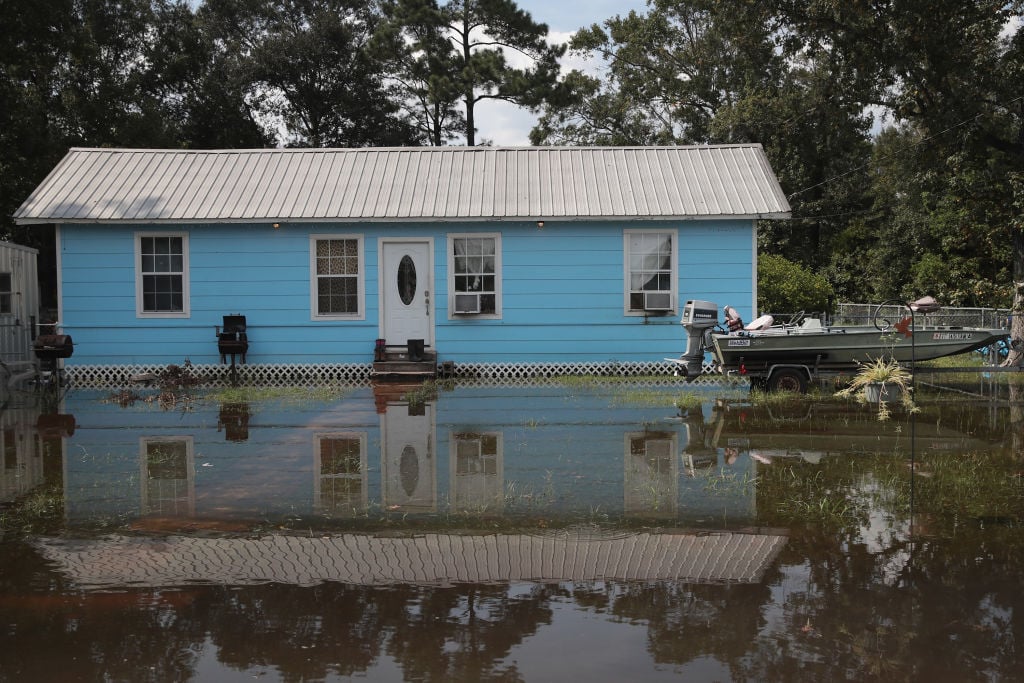 Floodwater surrounds a home after Hurricane Harvey