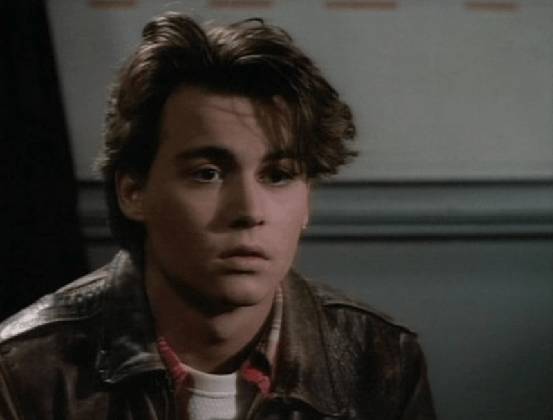 A young Johnny Depp stares ahead in '21 Jump Street'.