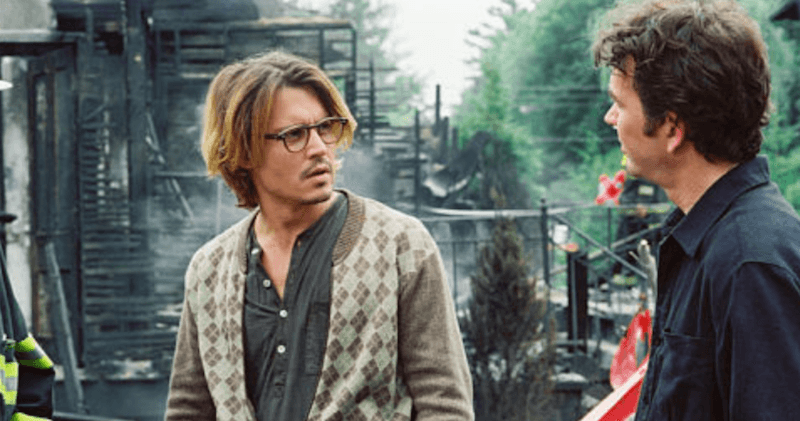 Johnny Depp as Mort in 'Secret Window' seen talking to Ted while outside. Johnny Depp as Mort in 'Secret Window' seen talking to Ted while outside.