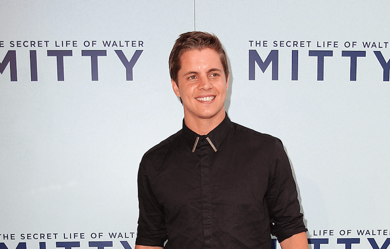 Johnny Ruffo smiles in a black shirt at an event in Australia. Johnny Ruffo smiles in a black shirt at an event in Australia.