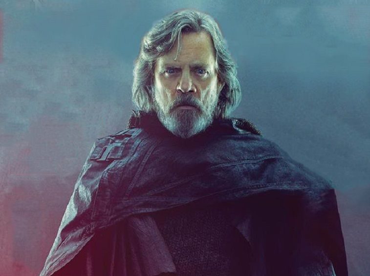 Luke Skywalker stands and looks ahead in an all-black outfit. Luke Skywalker stands and looks ahead in an all-black outfit.