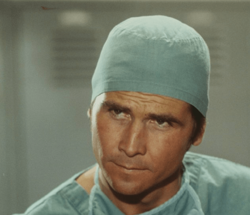 Marcus Welby looking serious in a medical cap and gown. Marcus Welby looking serious in a medical cap and gown.