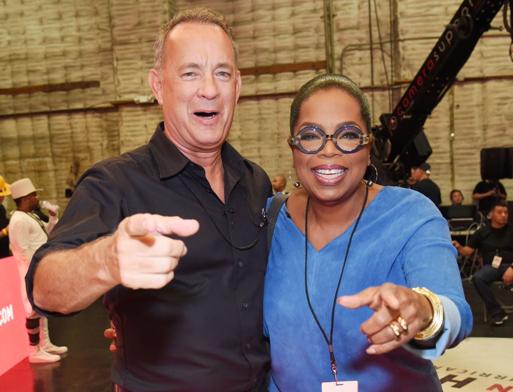 Tom Hanks and Oprah Winfrey in hand