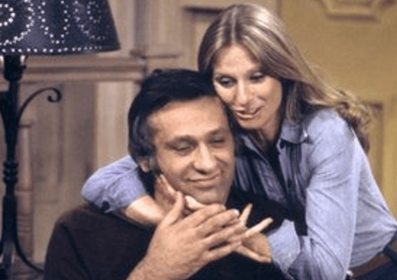 Cloris hugs Carmine as he grabs her hands. Cloris hugs Carmine as he grabs her hands.