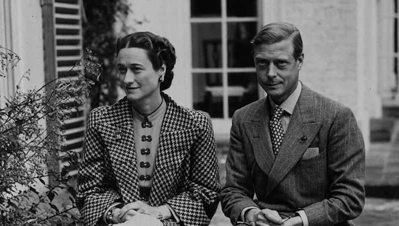 A black and white photo of Wallis Simpson and Edward VIII sitting side by side