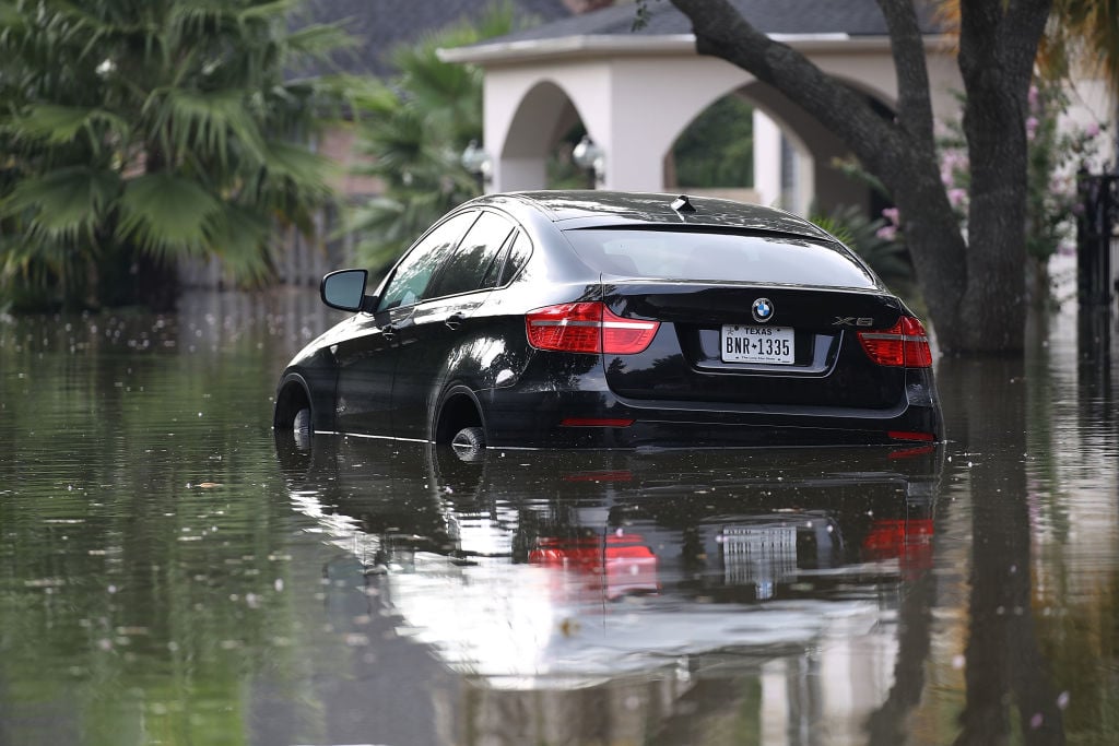 A car is stuck in water after Hurricane Harvey