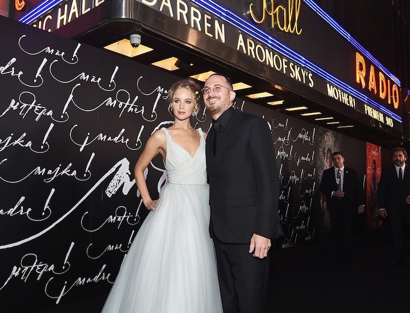 Jennifer Lawrence and Darren Aronofsky pose in front of Radio City 