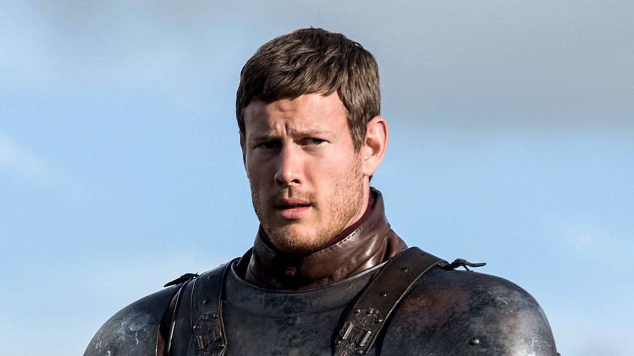 Dickon Tarly stands in armor under a blue sky Dickon Tarly stands in armor under a blue sky
