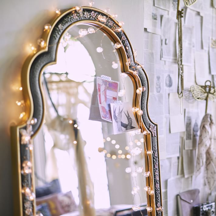 Elaborate arched mirror