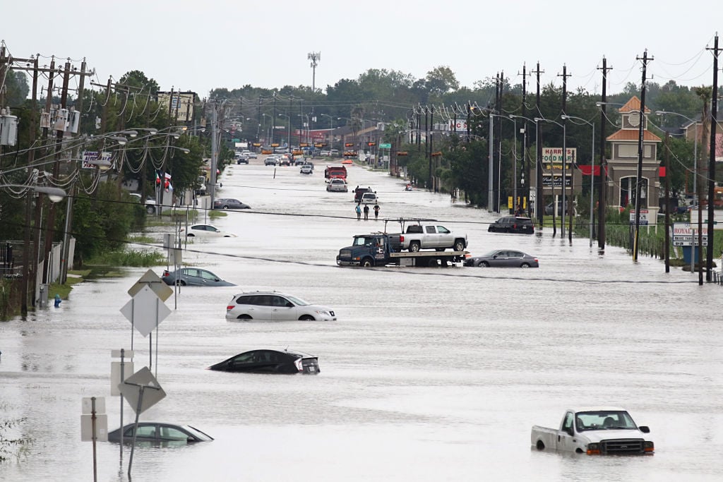 Water floods the street after Hurricane Harvey.