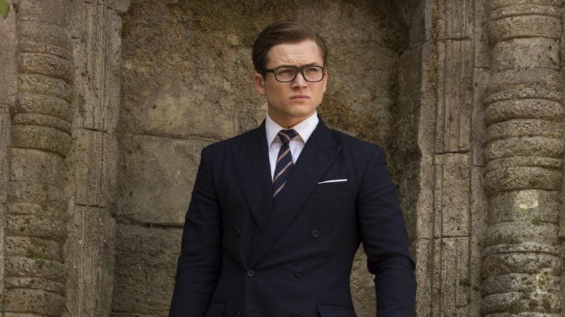 Taron Egerton wears a suit in Kingsman: The Golden Circle Taron Egerton wears a suit in Kingsman: The Golden Circle