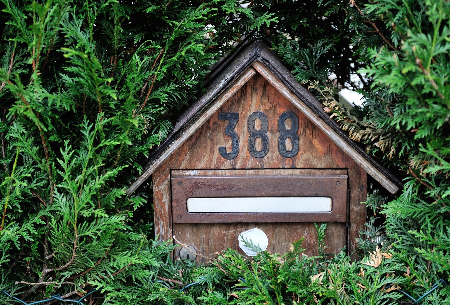 Wooden mailbox with numbers