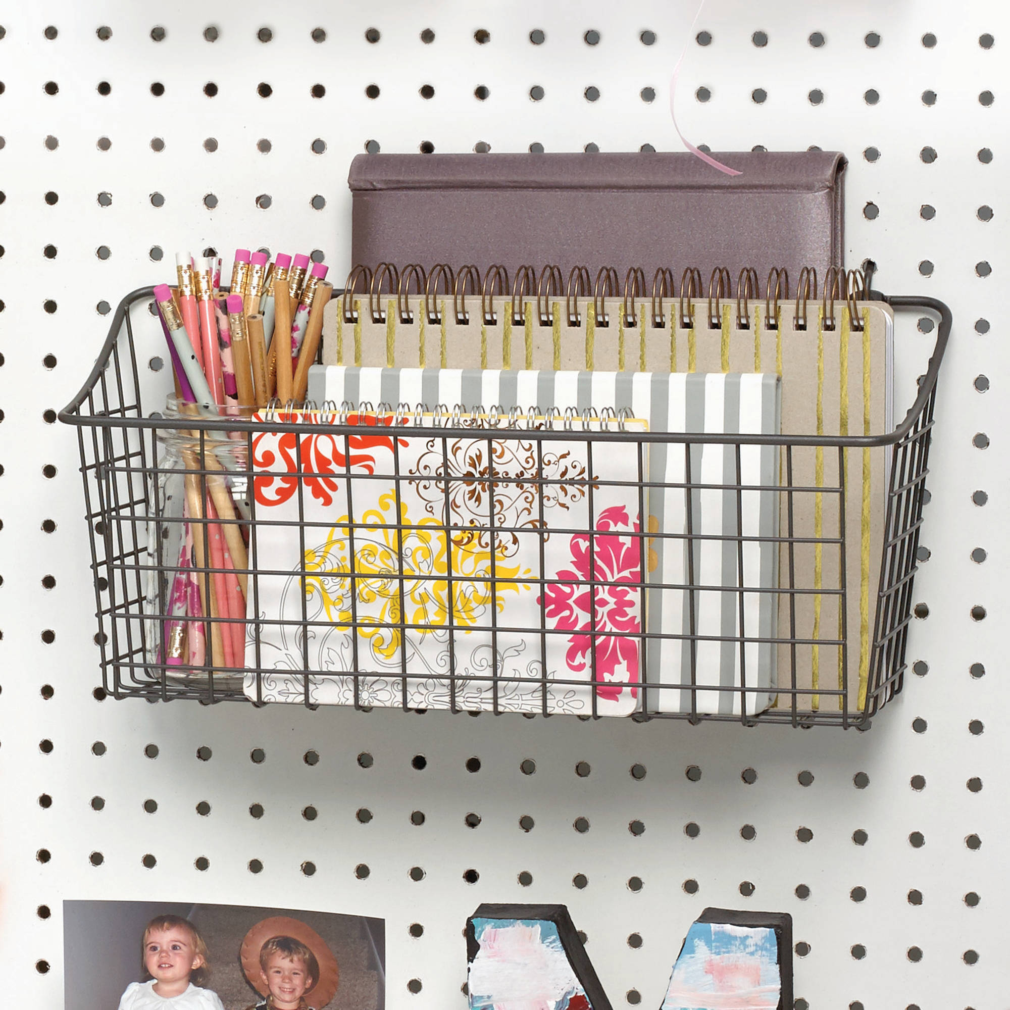 Pegboard with notebooks