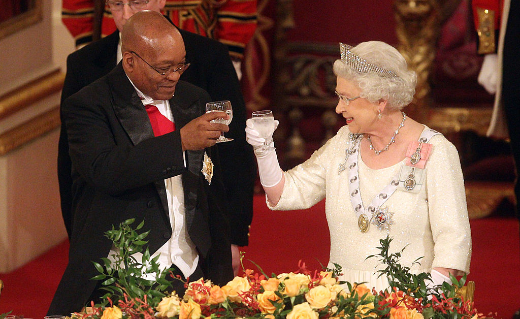 Queen Elizabeth toasts with champagne