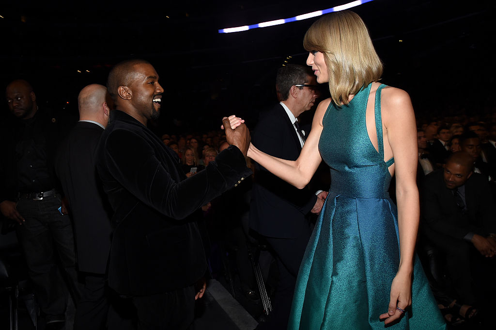 Taylor Swift and Kanye West grab hands