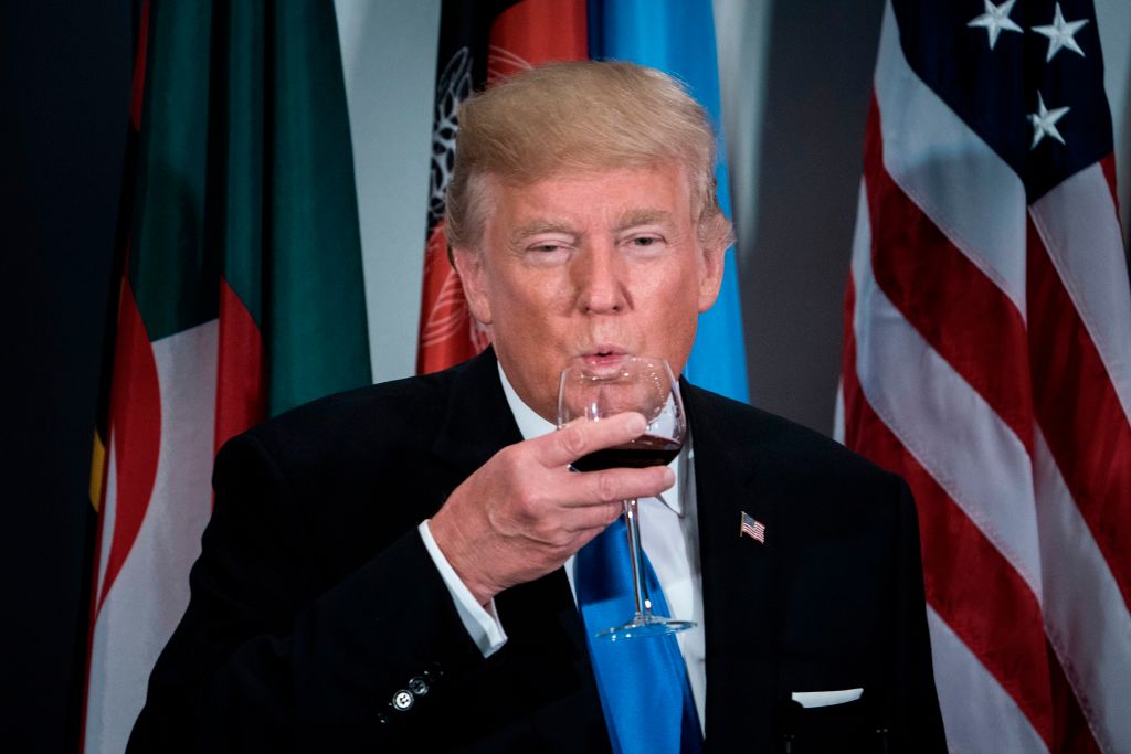 Trump drinking wine