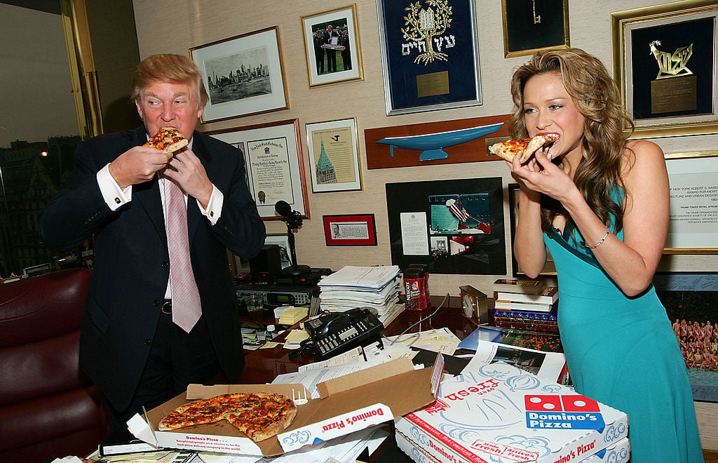 Trump eating pizza