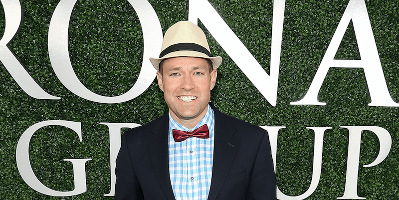 Andy Baldwin smiling in front of a green backdrop. Andy Baldwin smiling in front of a green backdrop.