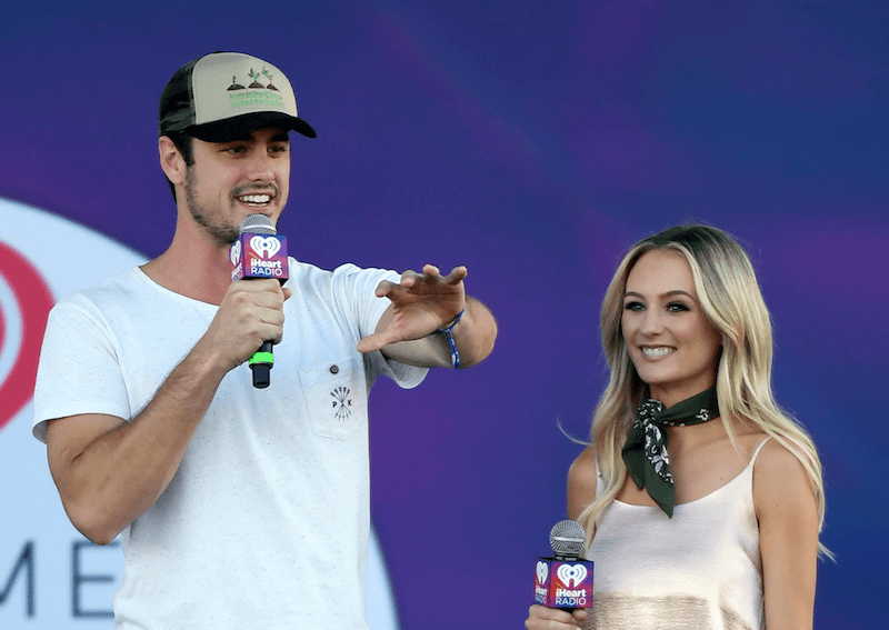 Ben Higgins and Lauren Bushnell standing next to each other as they hold microphones. Ben Higgins and Lauren Bushnell standing next to each other as they hold microphones.