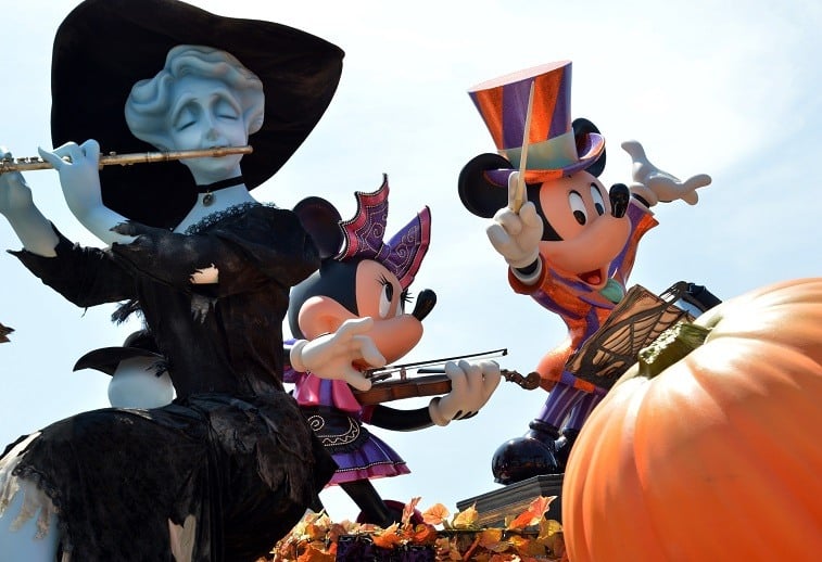 Mickey and Minnie Mouse dressed up for Halloween