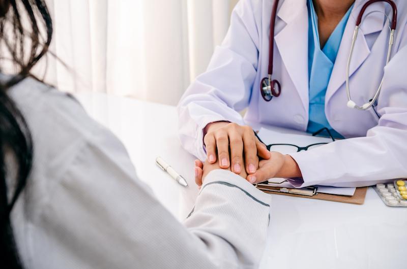 doctor consulting with patient