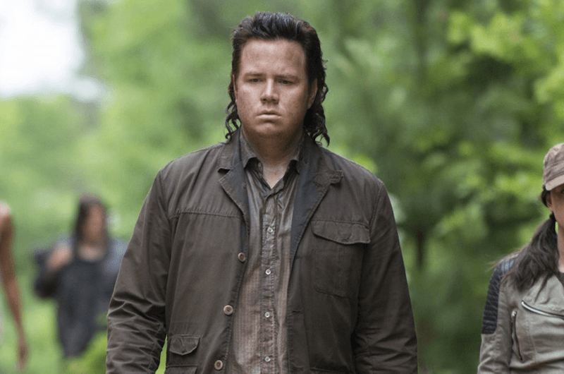 Eugene Porter walking and staring downward at the ground. Eugene Porter walking and staring downward at the ground.
