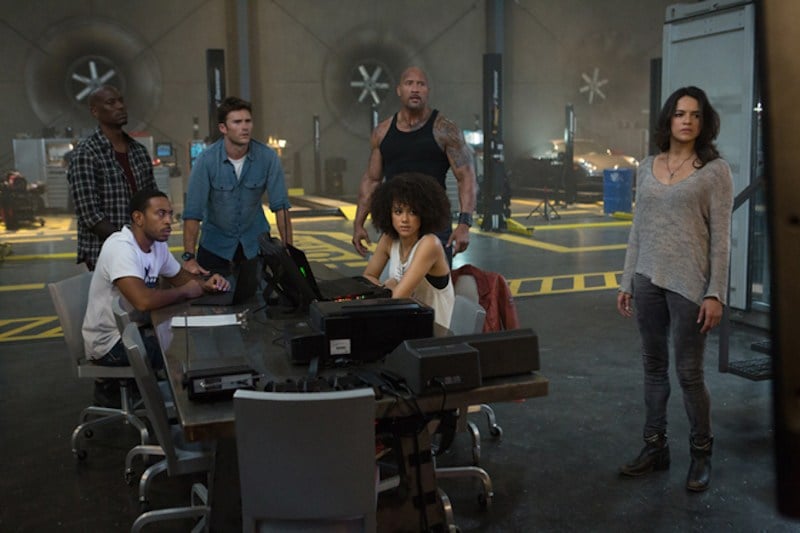 The Fast and Furious cast sits around a table The Fast and Furious cast sits around a table
