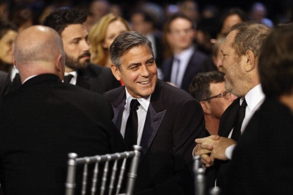 George Clooney and Harvey Weinstein attend the 18th Annual Critics' Choice Movie Awards held at Barker Hangar on January 10, 2013 in Santa Monica, California. George Clooney and Harvey Weinstein attend the 18th Annual Critics' Choice Movie Awards held at Barker Hangar on January 10, 2013 in Santa Monica, California.