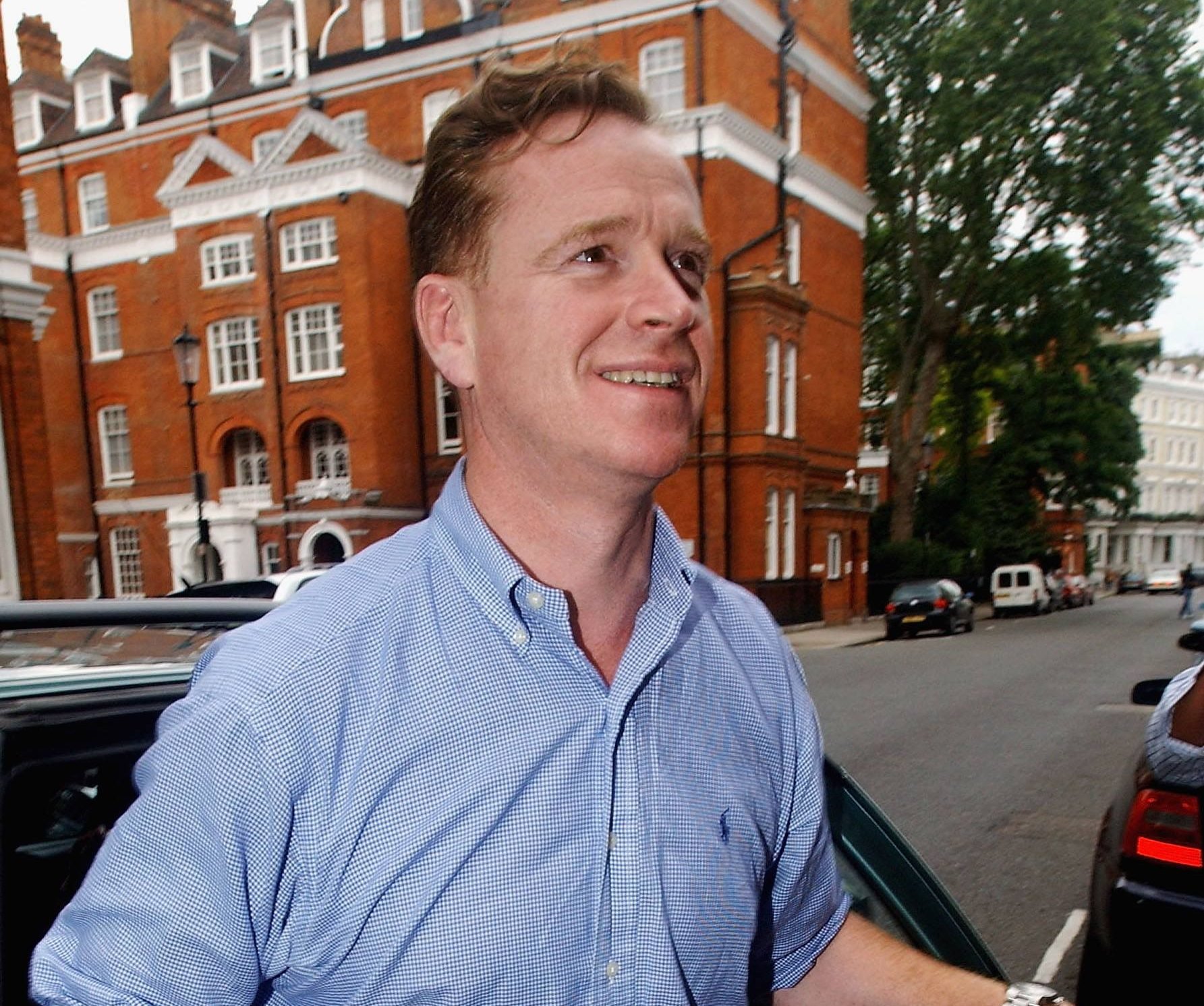 LONDON - JULY 22: Major James Hewitt returns home, following his arrest on drugs charges last night, to his South Kensington residence on July 22, 2004 in London. The Major was detained at the Cactus Bar in Fulham Road along with former Sky News freelance presenter Alison Bell on suspicion of supplying class A drugs. Both were questioned at Notting Hill police station before being bailed until September. (Photo by Steve Finn/Getty Images)