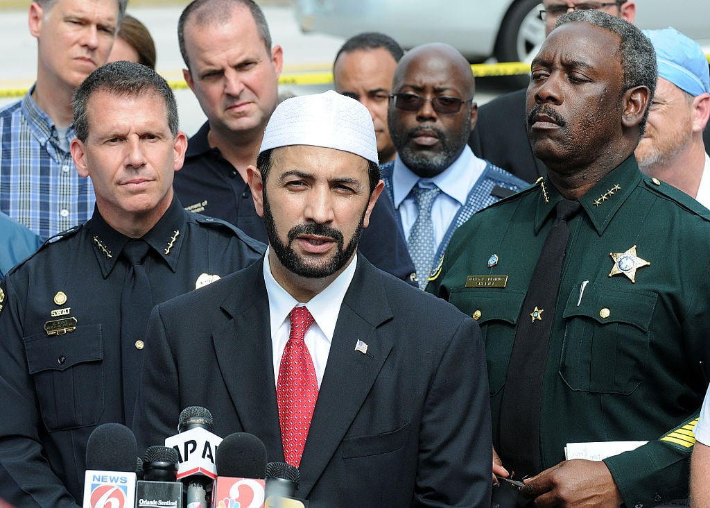 The Iman of the Islamic Society of Central Florida speaks with law enforcement The Iman of the Islamic Society of Central Florida speaks with law enforcement