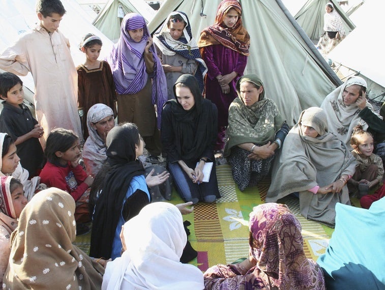 Goodwill Ambassador Angelina Jolie talks with refugees 