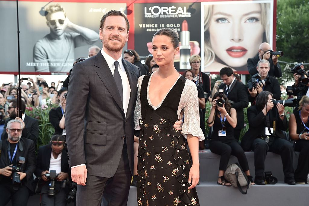 Michael Fassbender and Alicia Vikander pose together