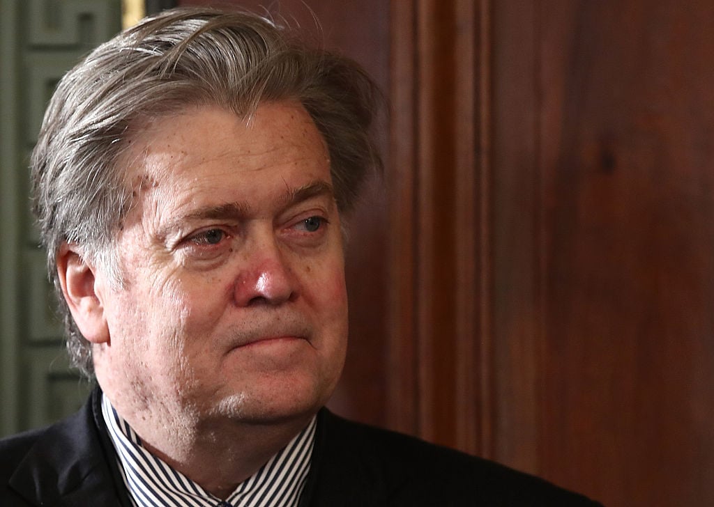 Steve Bannon against curtains, facing right Steve Bannon against curtains, facing right