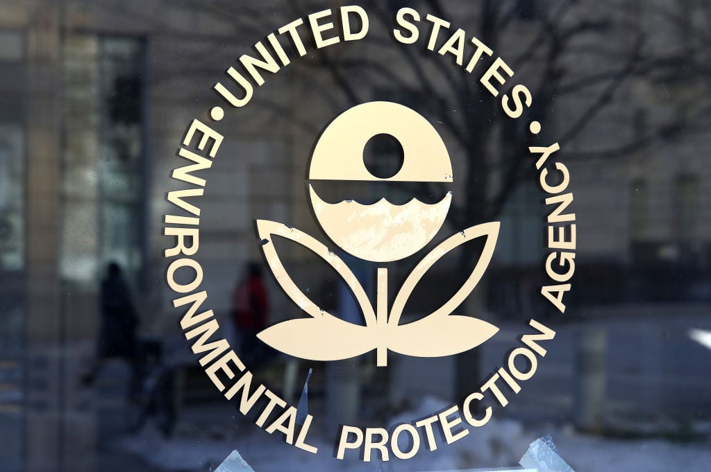 The United States Environmental Protection Agency logo on its glass door in cream lettering The United States Environmental Protection Agency logo on its glass door in cream lettering
