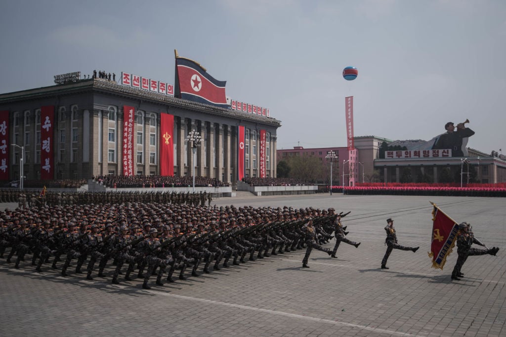 north korea military marching at the capitol