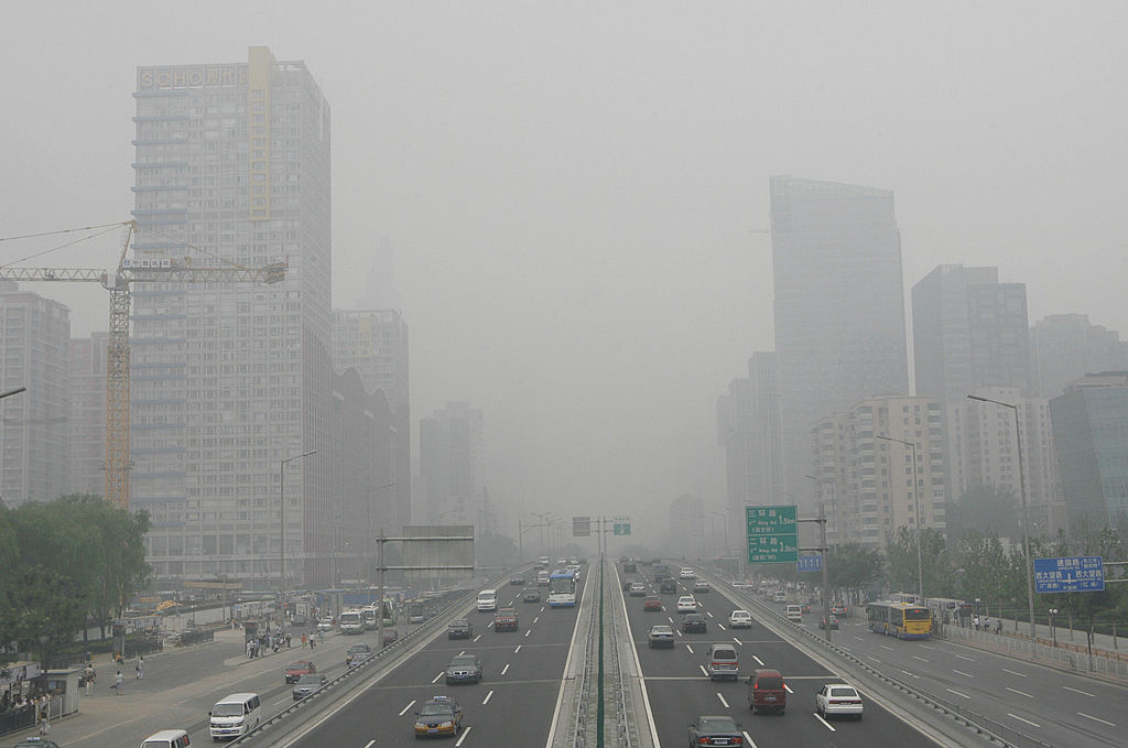 A smog filled skyline nearly fogs out a city A smog filled skyline nearly fogs out a city