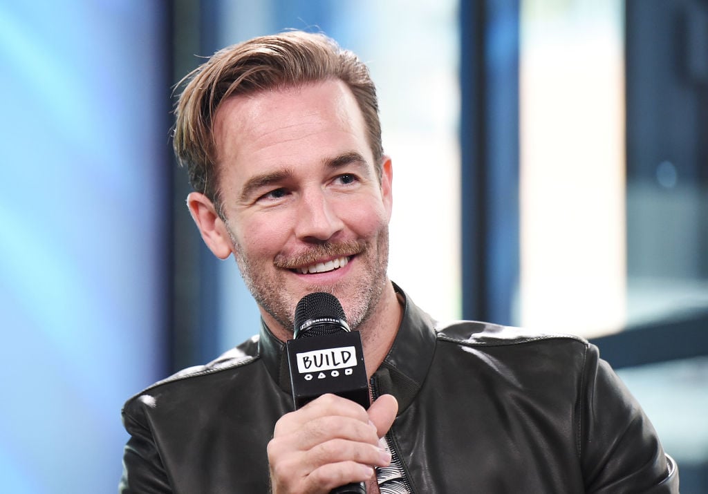 James Van Der Beek smiles and speaks into a microphone James Van Der Beek smiles and speaks into a microphone