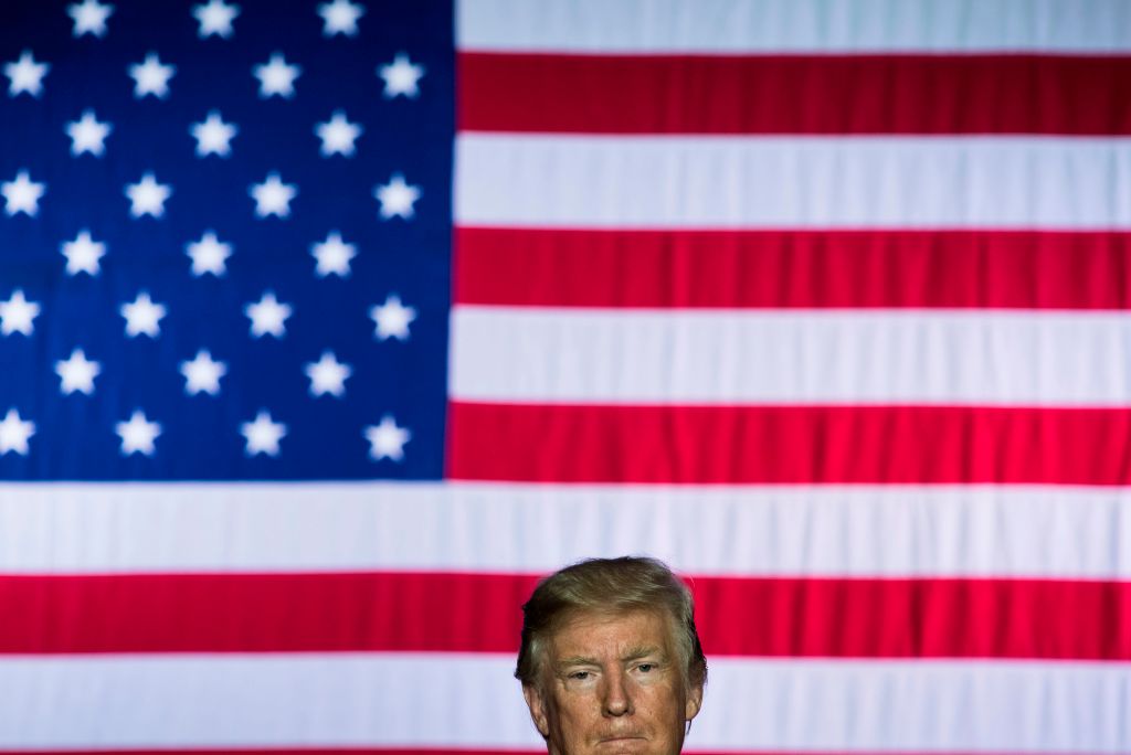 donald trump's head in front of a flag donald trump's head in front of a flag