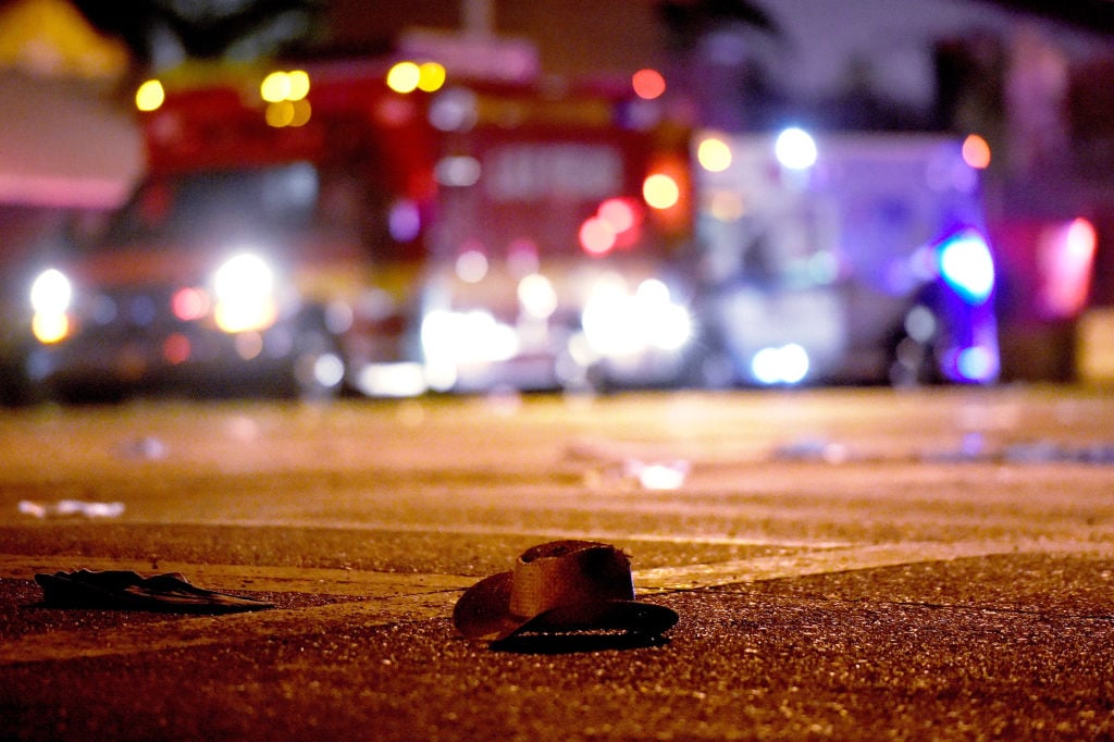 A cowboy hat lays in the street after shots were fired near a country music festival