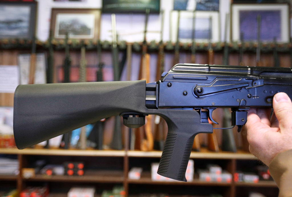 a bump stock on a gun close-up