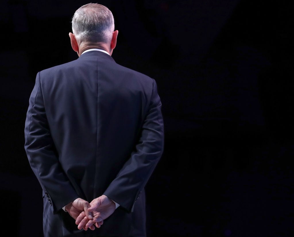 john mattis in a dark suit with his back to the camera john mattis in a dark suit with his back to the camera
