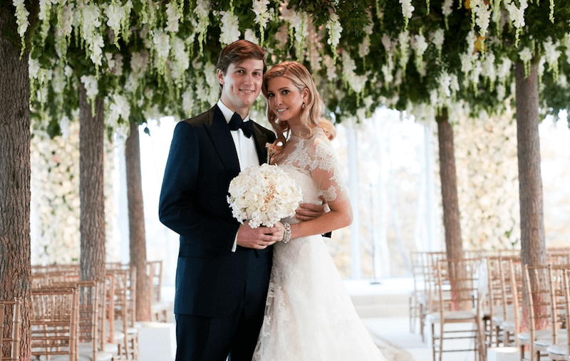 Jared Kushner and Ivanka Trump pose together on their wedding day.